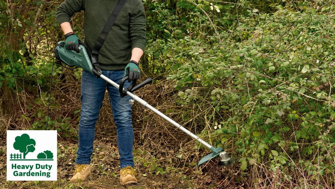 Bosch Home and Garden elektryczna kosa do zarośli AFS 23-37 (950 W, średnica cięcia Ø: 23 cm (ostrze), 37 cm (gwint), gwint Ø: 3,5 mm, w opakowaniu)