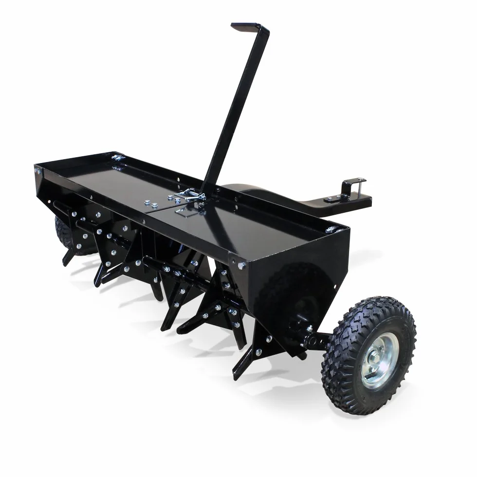 Wertykulator aerator trawnika do traktora-kosiarki z szerokością roboczą 102cm i głębokością pracy ok. 7,6cm